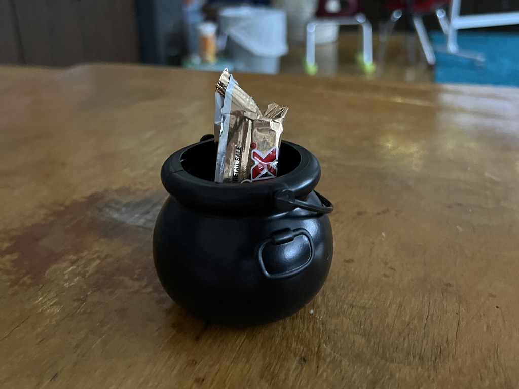 A candy bar inside a little pot