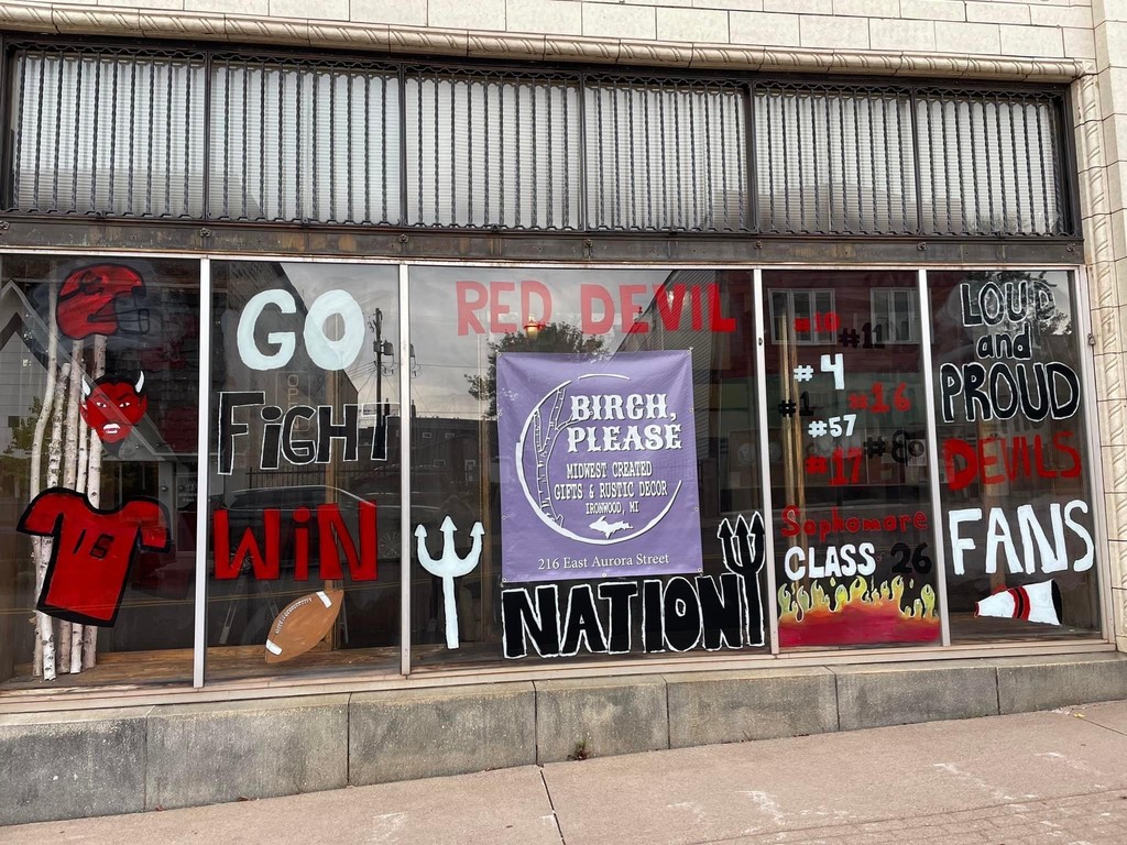 Homecoming decorations on a store window